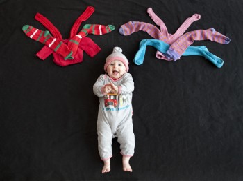 baby with sock octopus