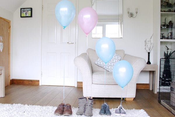 Helium balloons tied to shoes