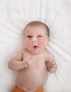 baby making silly face