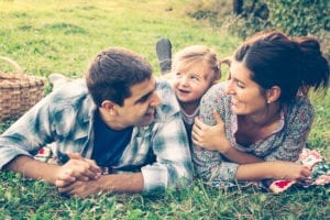 Family in a park by Asife via Shutterstock