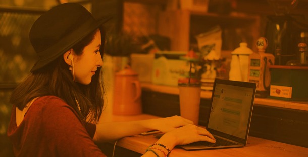 woman on laptop with affilinet on BritMums