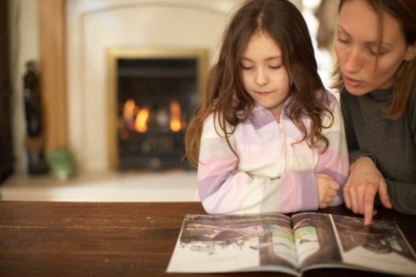 Gas Safe image of mum & girl in front of fire