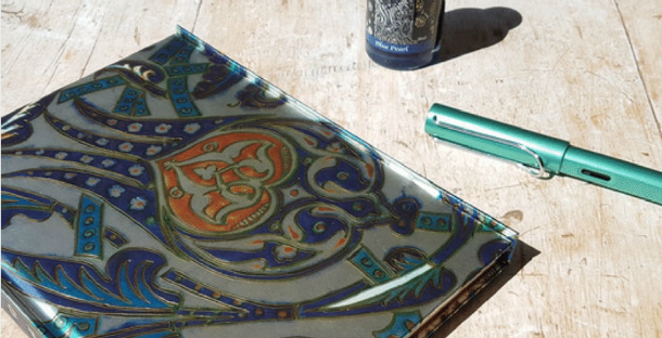 notebook and Lamy fountain pen 610