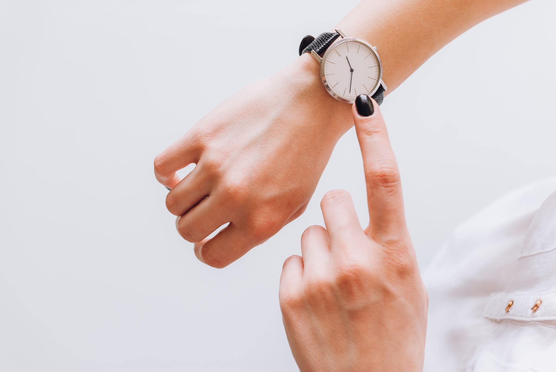 Woman checking wristwatch