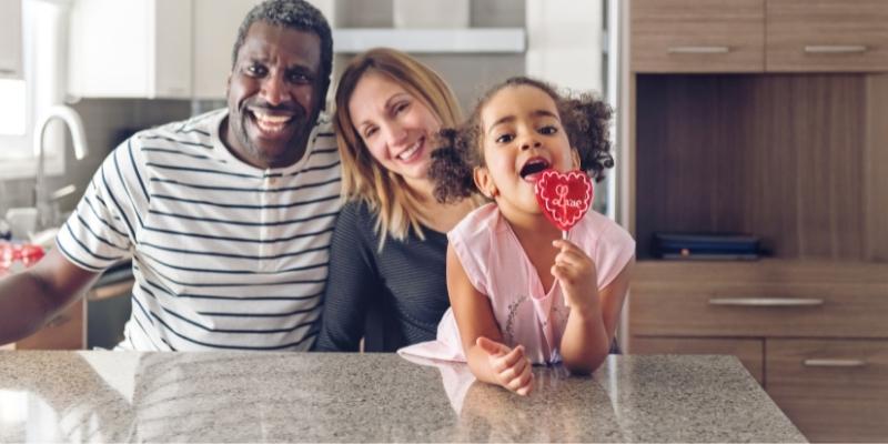 dad mum and daughter celebrating valentine's day
