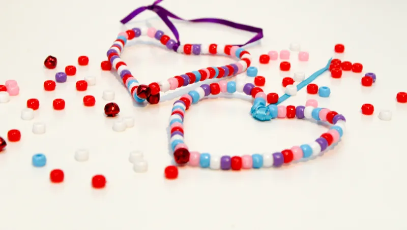 Hanging beaded love heart decoration with red and blue beads more Family Fun Valentine Crafts