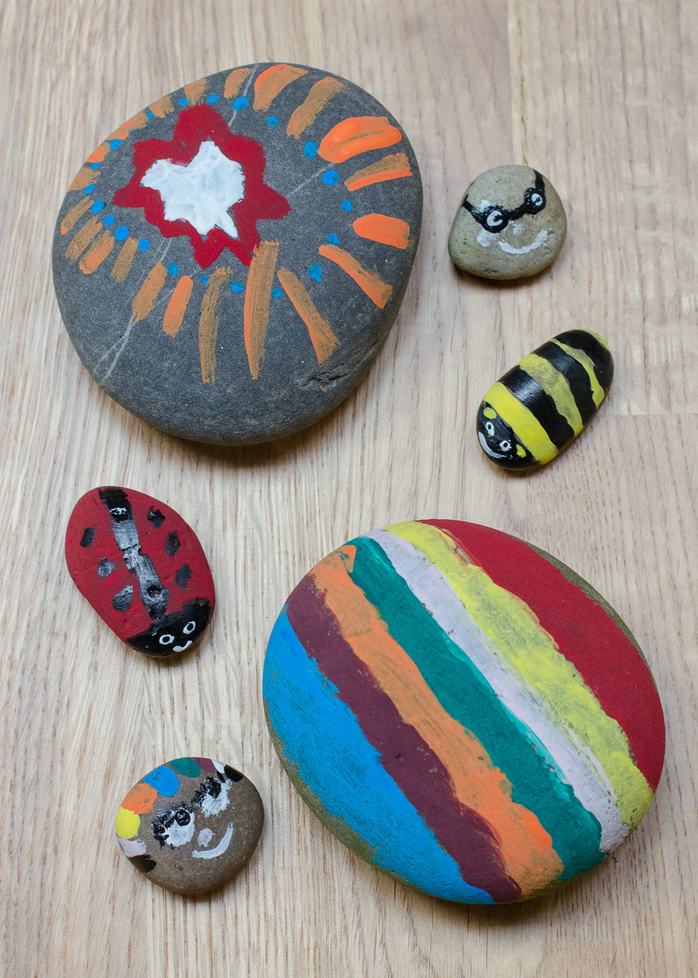 Painted rocks on a table 