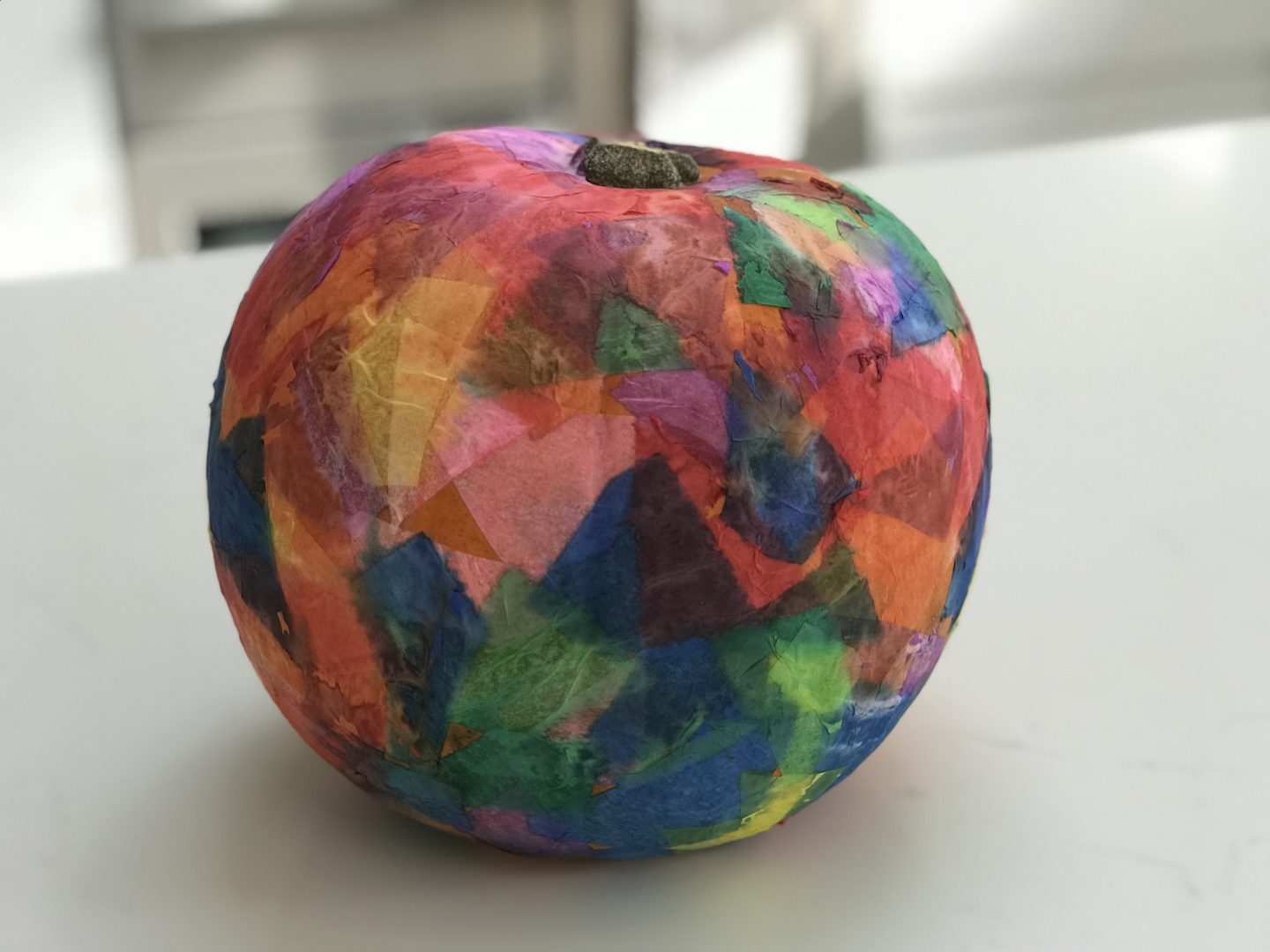 Simple tissue paper pumpkin craft for toddlers.