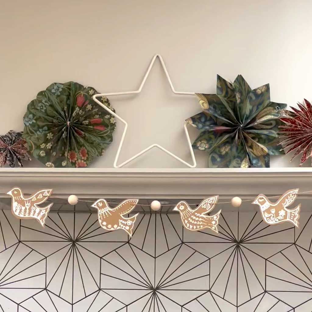 Make this super pretty Cardboard Dove garland